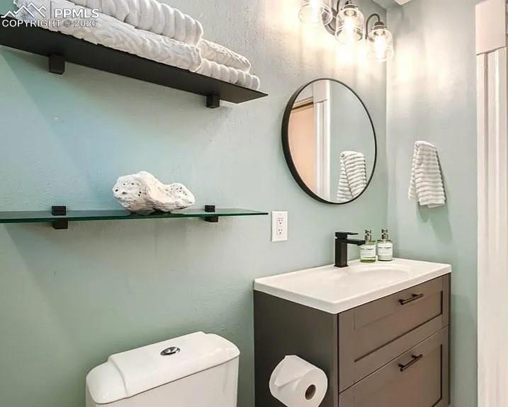 Image 8 of 18: Main level bath