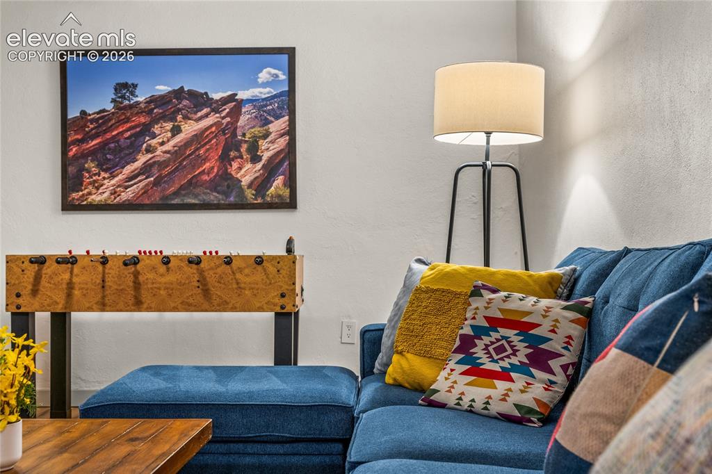 Image 26 of 39: Sitting room featuring a textured wall