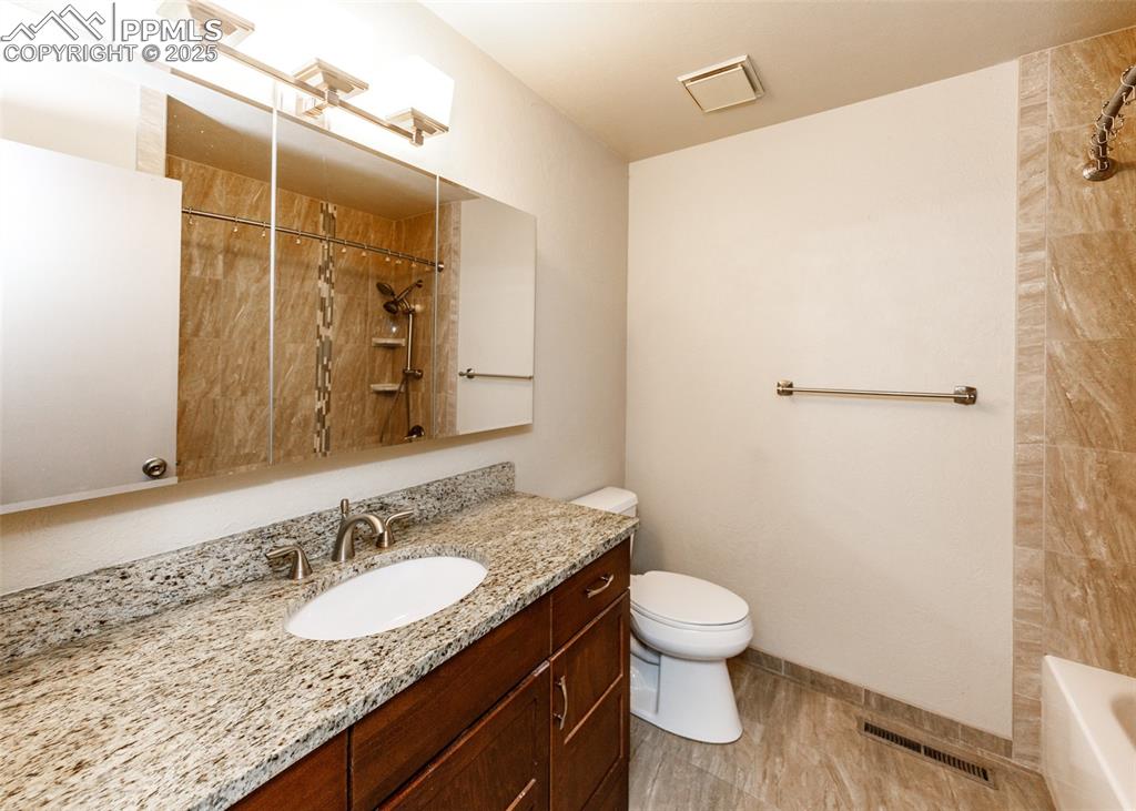 Image 23 of 50: Full Bath on Upper Level