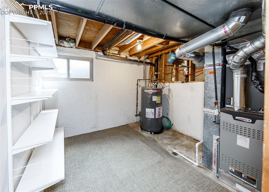 Image 40 of 50: Mechanical Room w/Storage in Basement