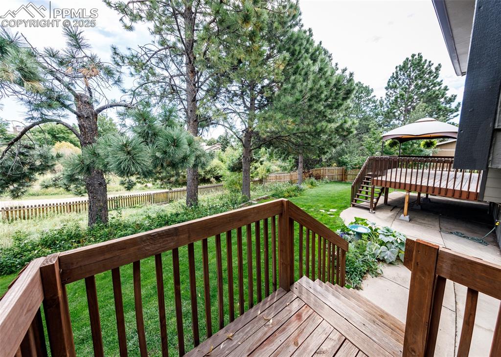 Image 46 of 50: View of Deck and Backyard