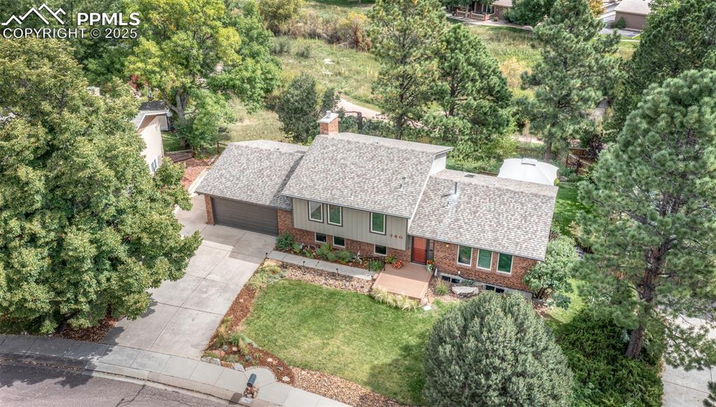 Image 50 of 50: Aerial View of Home that features Open Space Behind with Walking Trail