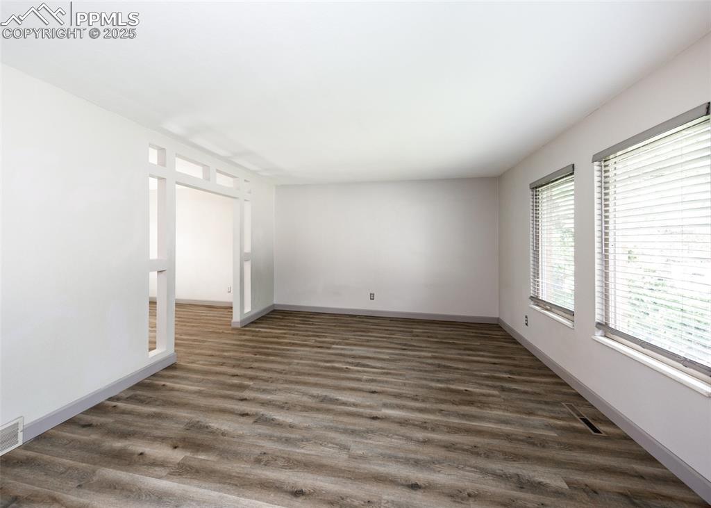 Image 6 of 50: View from Living Room to Dining Room