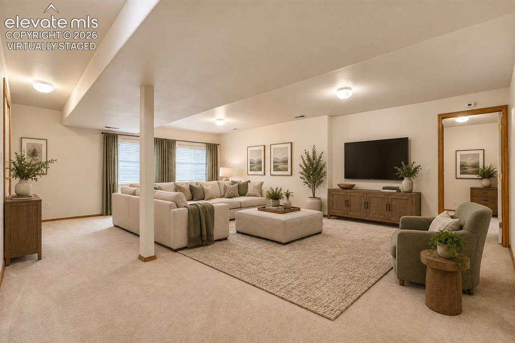 Image 32 of 50: Virtually Staged- Family room basement