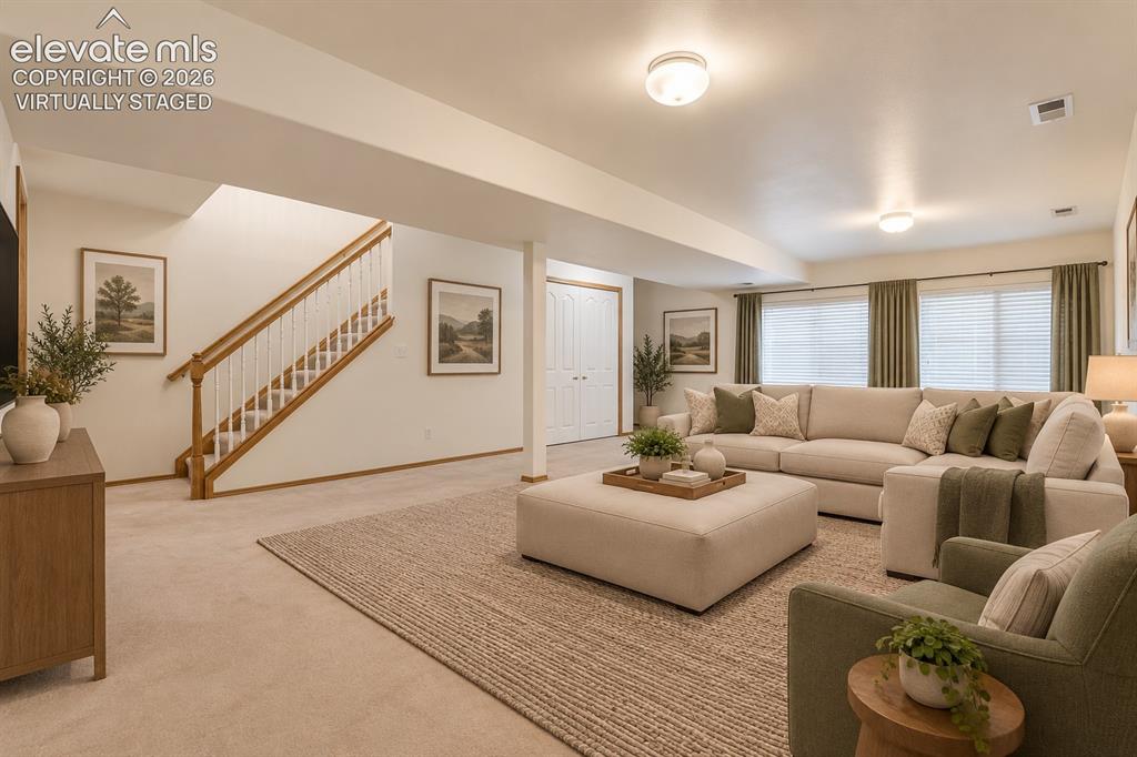 Image 34 of 50: Virtually staged Family room basement
