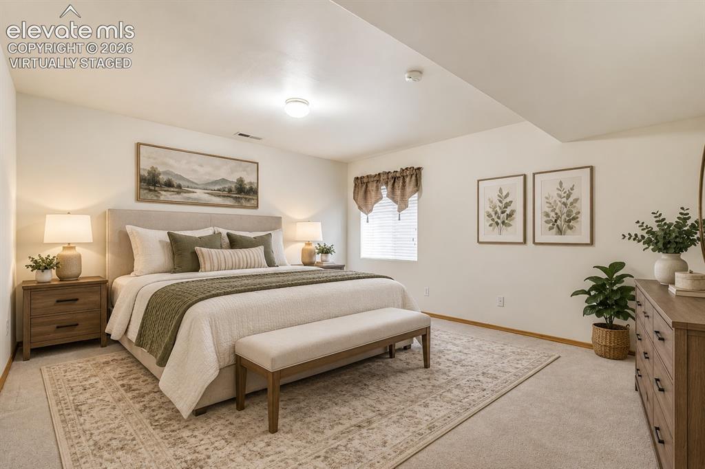 Image 36 of 50: Virtually Staged-Basement second bedroom