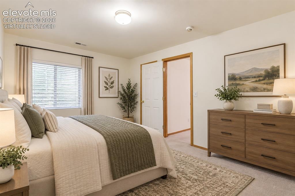 Image 41 of 50: Virtually staged-Basement third bedroom