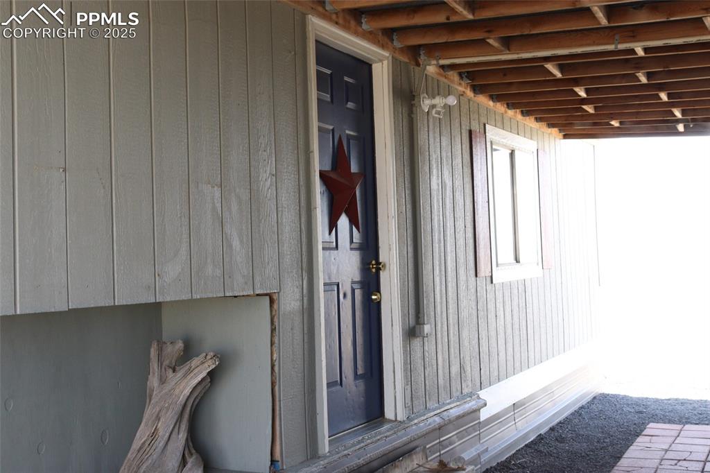 Image 17 of 29: Entry to second home side.