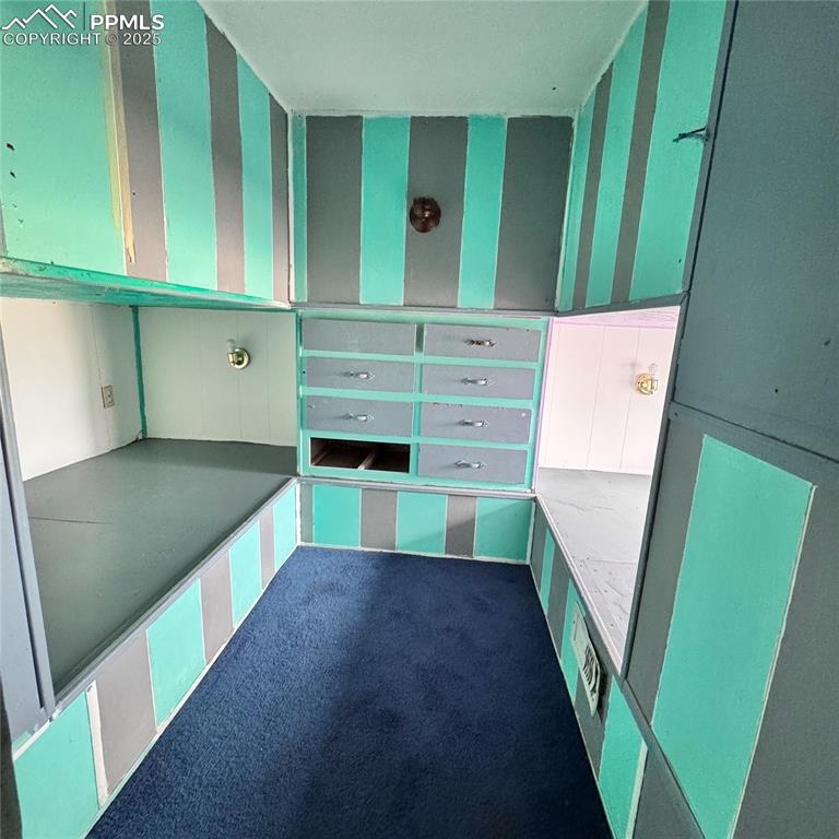 Image 21 of 29: North side home bunk room / potential non-conforming bedroom