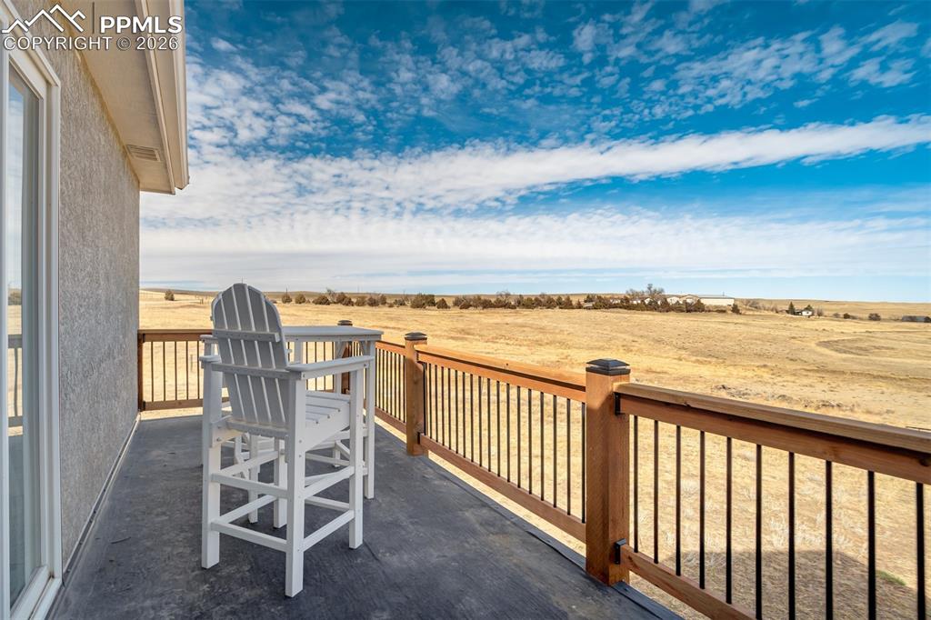Image 13 of 44: Private deck off the primary bedroom.