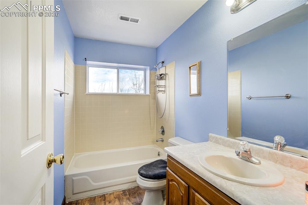 Image 23 of 44: Basement full bath.