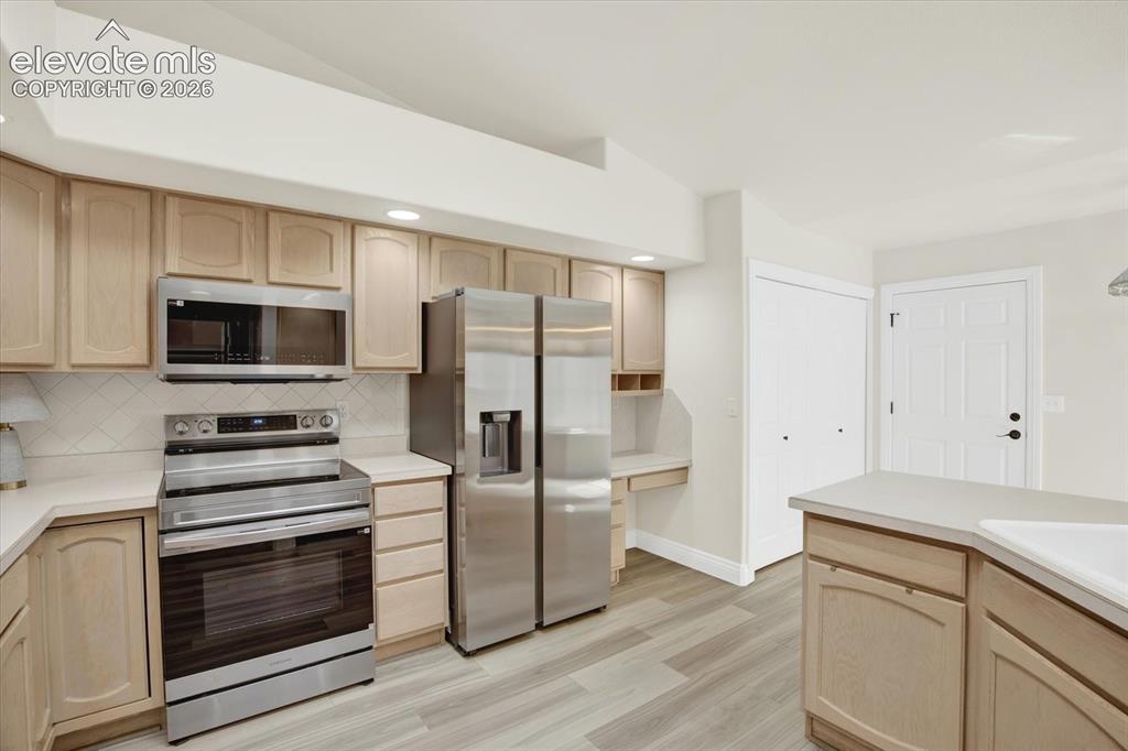 Image 13 of 46: New stainless appliances