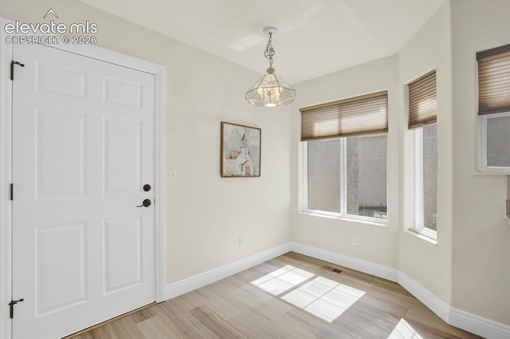 Image 16 of 46: Eat-in area of the kitchen.