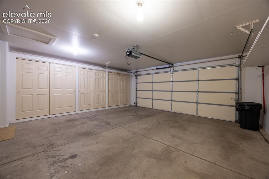 Image 29 of 46: Fully Finished garage with built-in storage!