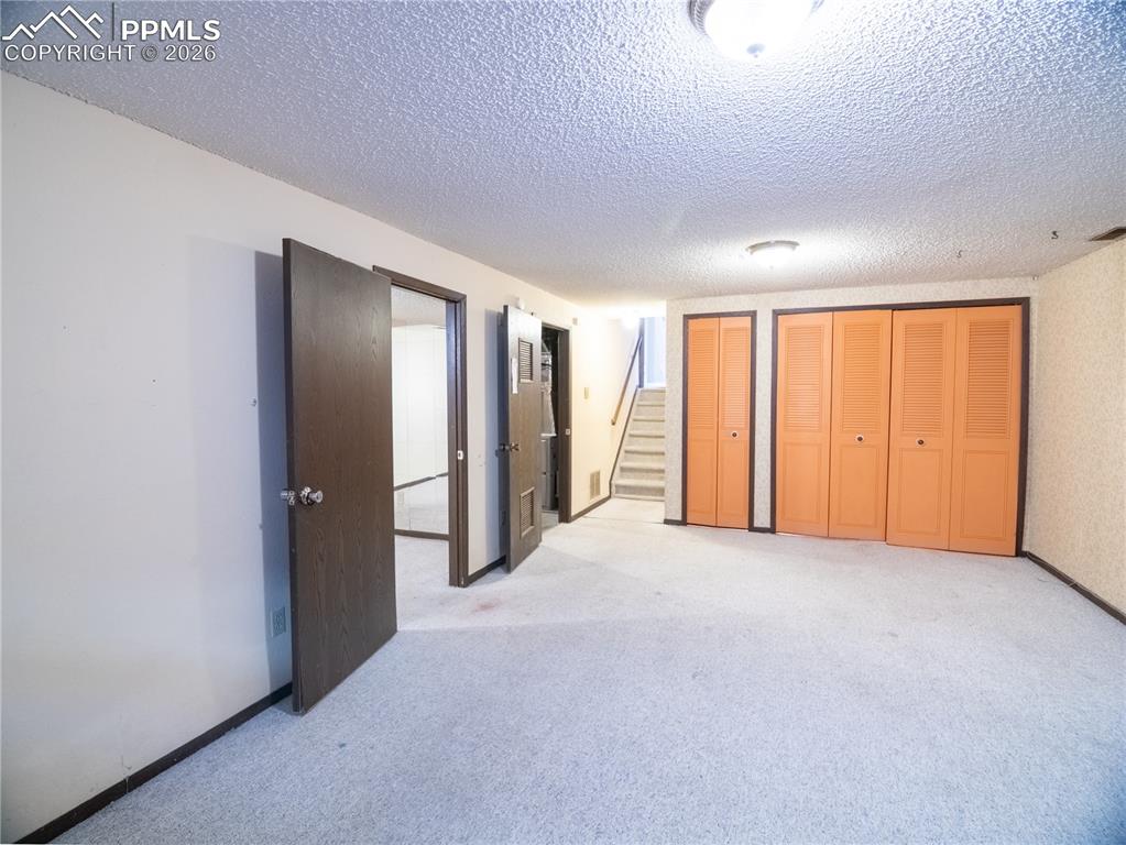 Image 23 of 25: Basement entertainment room