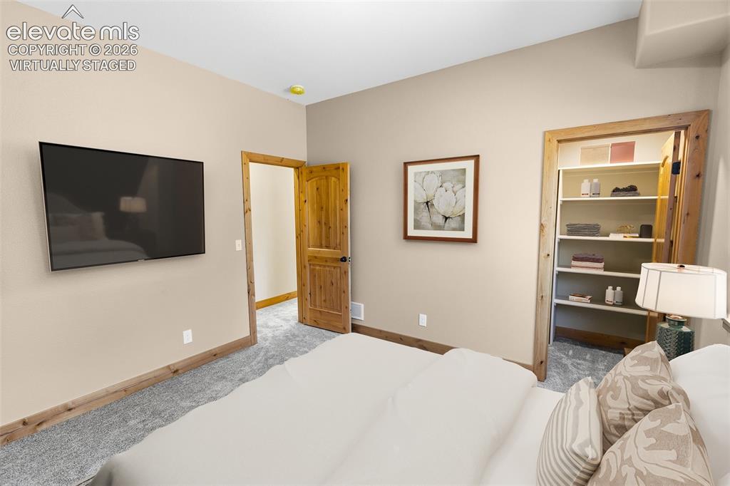 Image 18 of 37: Lower Level Bedroom 2 - Virtually Staged