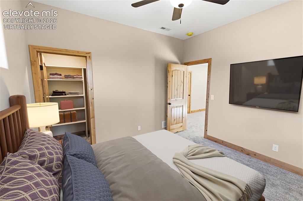 Image 21 of 37: Lower Level Bedroom 3 - Virtually Staged