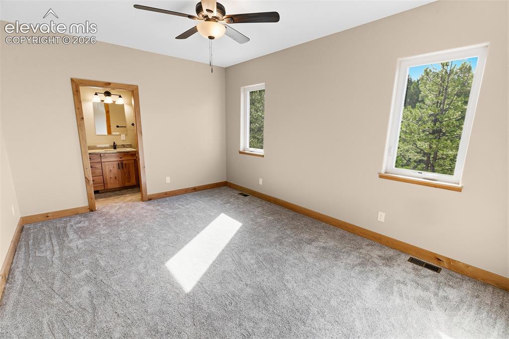 Image 29 of 37: Master Bedroom
