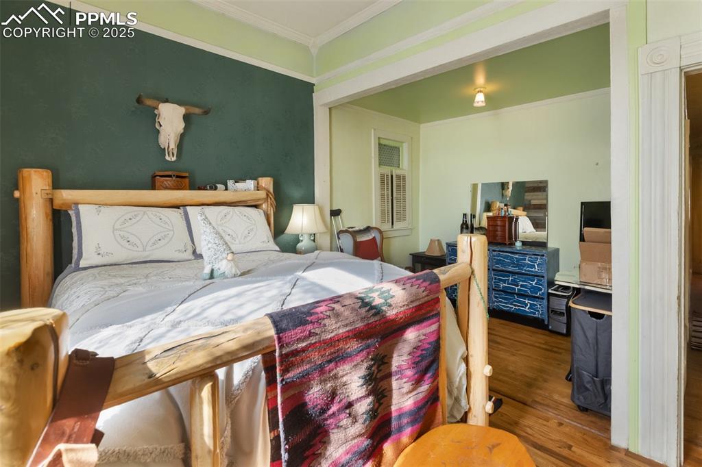 Image 33 of 43: downstairs Master, lots of closet space great decor