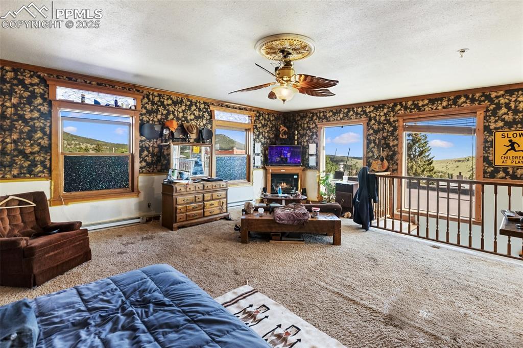 Image 40 of 43: here is the very large upstairs bedroom, really a bedroom/living room combo