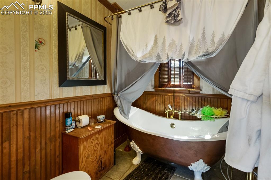 Image 42 of 43: the upstairs bathroom is very thoughtfully arranged clawfoot tub and plenty