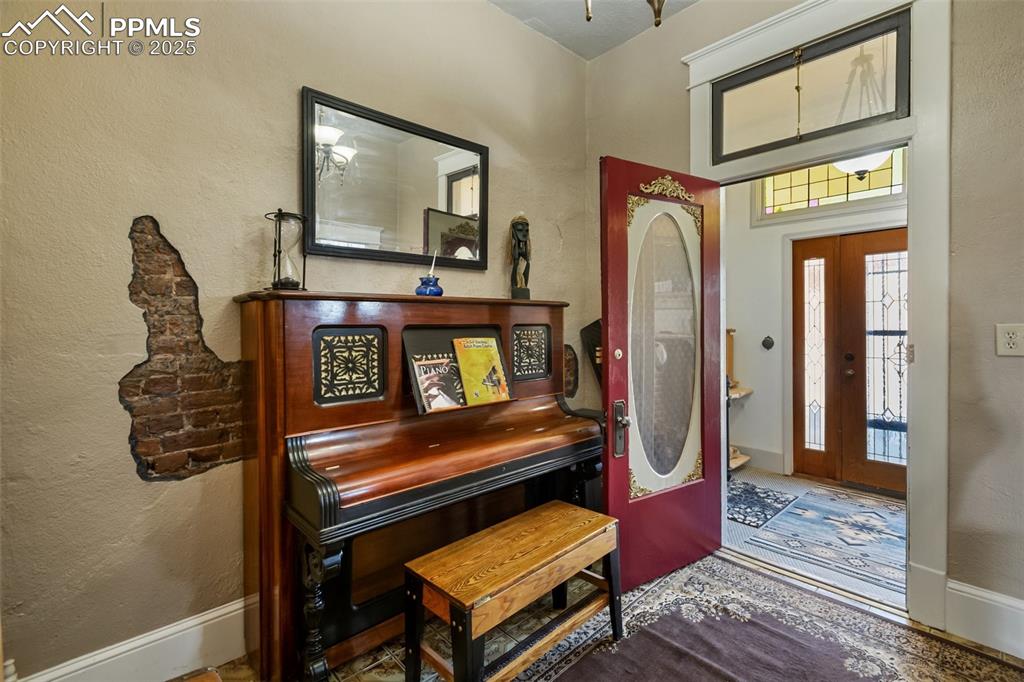 Image 7 of 43: this is the "foyer" or "piano room" you enter it from the Entry (door from