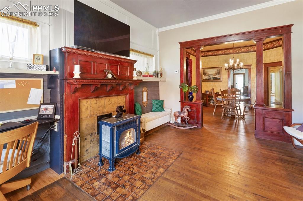 Image 8 of 43: looking from east to west, you can see the dining table in the Dining Room