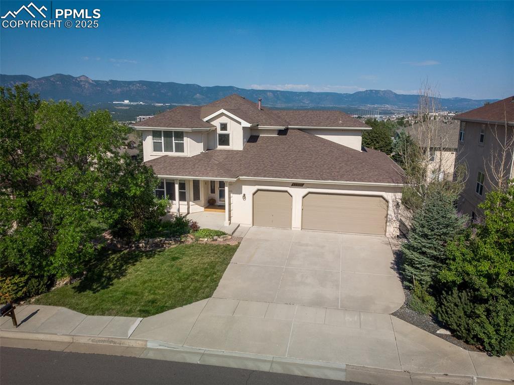 Image 3 of 50: View of front of property featuring a mountain view