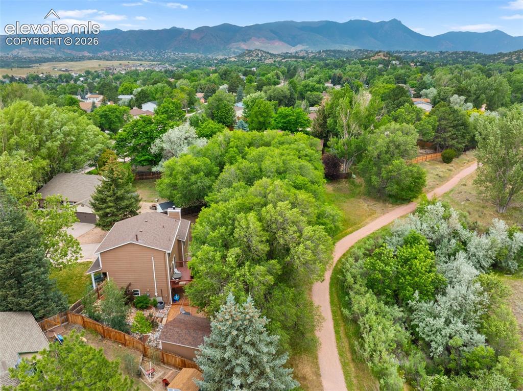 Image 37 of 42: Aerial perspective showcasing a residential property with a brown exterior