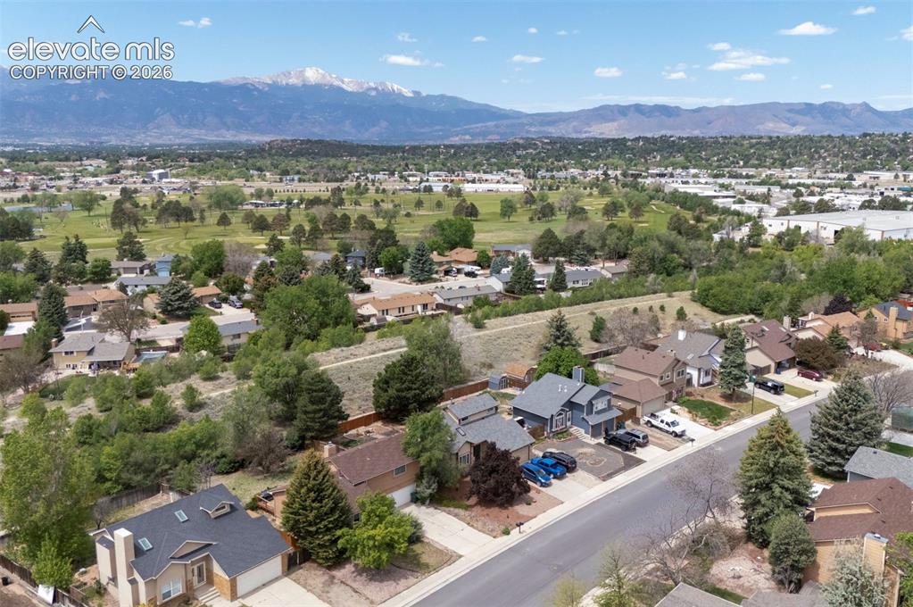 Image 7 of 43: Residential neighborhood featuring a mix of single-family homes, mature tre