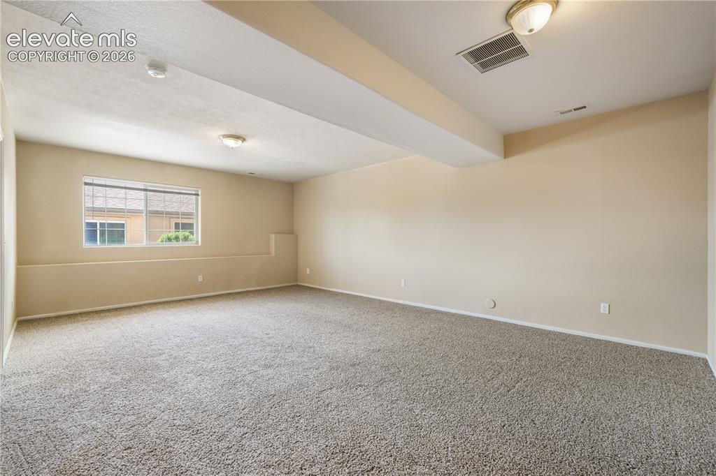 Image 36 of 50: Basement family room