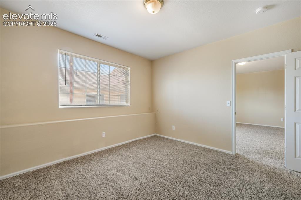 Image 42 of 50: Basement 3rd bedroom