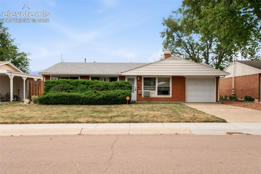 Caption: Front of this beautiful ranch style home! 
