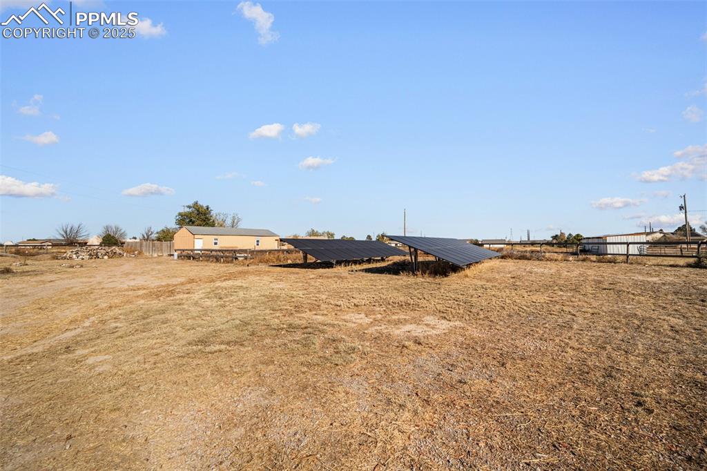 Image 11 of 12: View of yard with a view of rural / pastoral area