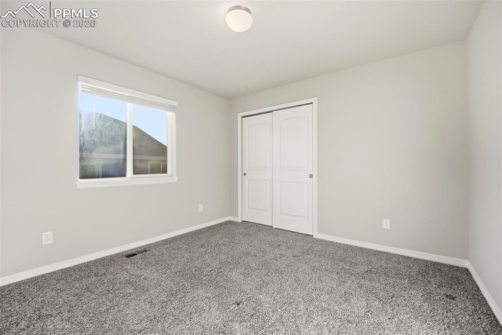 Image 28 of 49: Bedroom