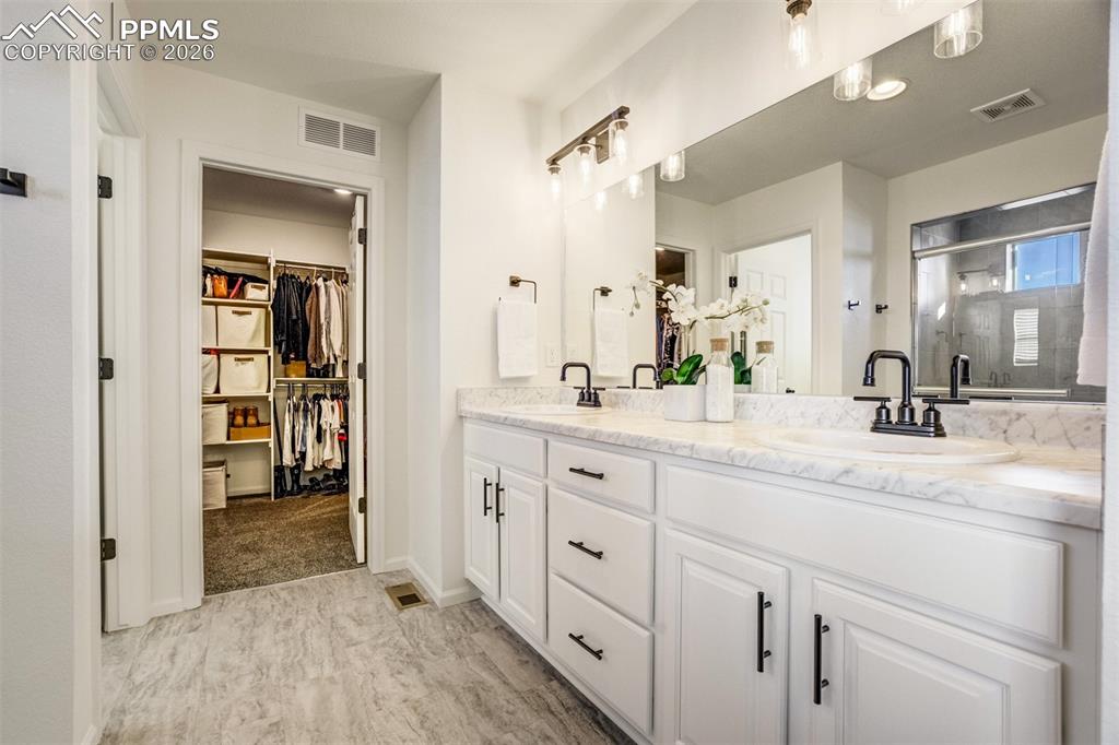 Image 17 of 43: A space designed for both function and a little bit of luxury.