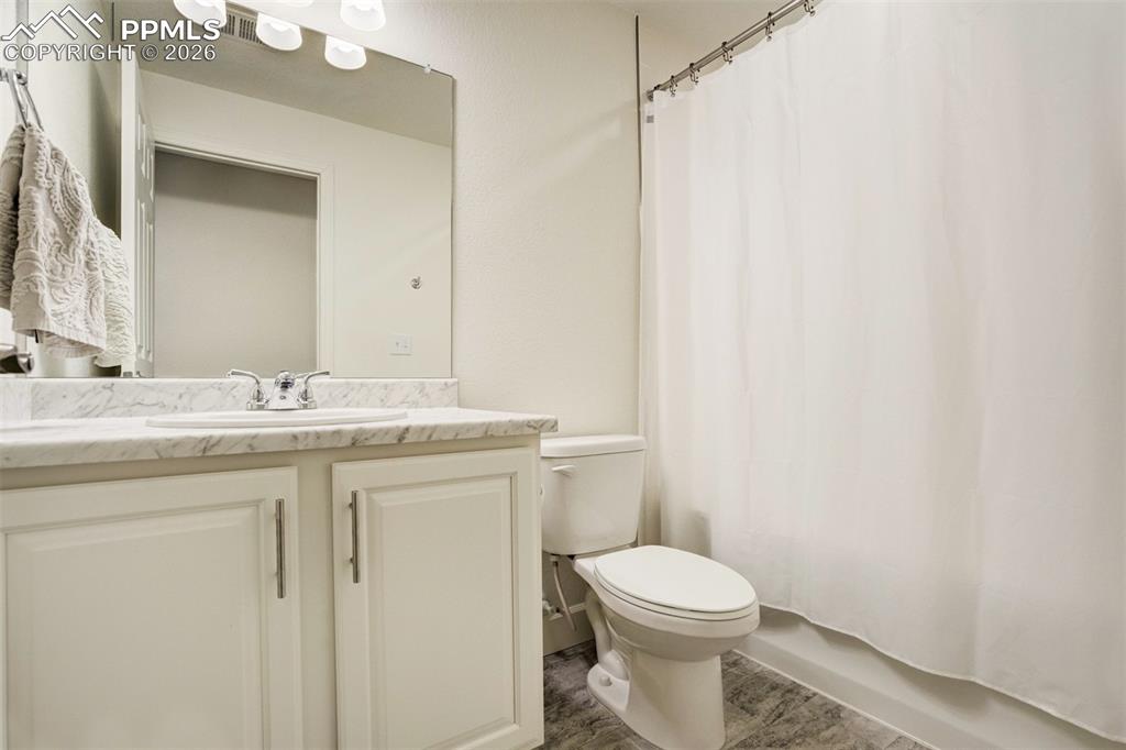 Image 33 of 43: Full bathroom in the basement. 