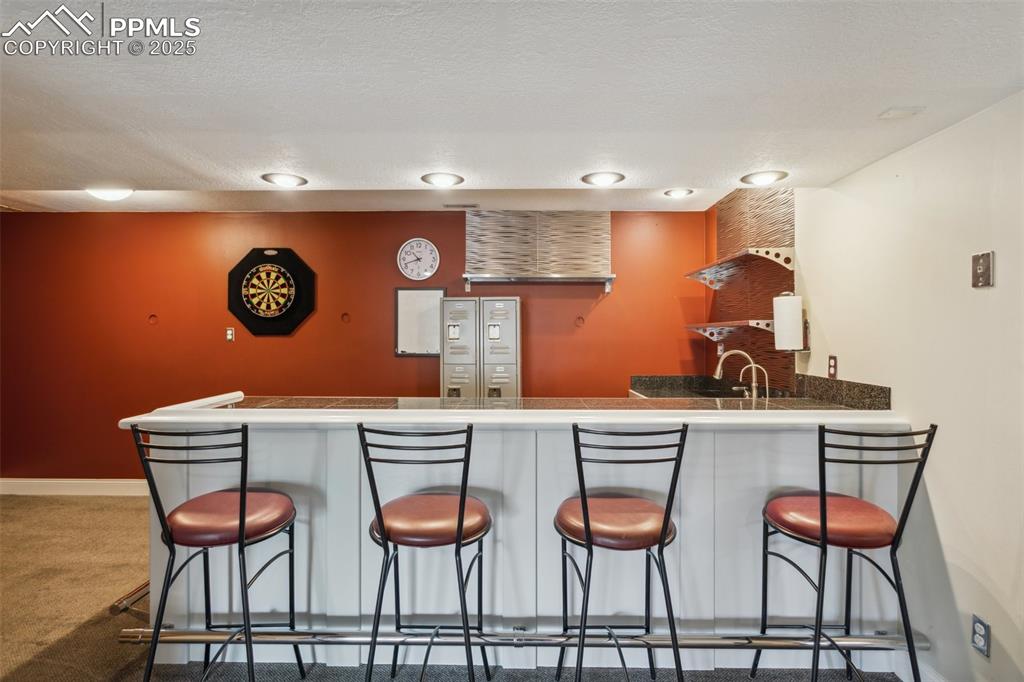 Image 41 of 50: Barstools included!