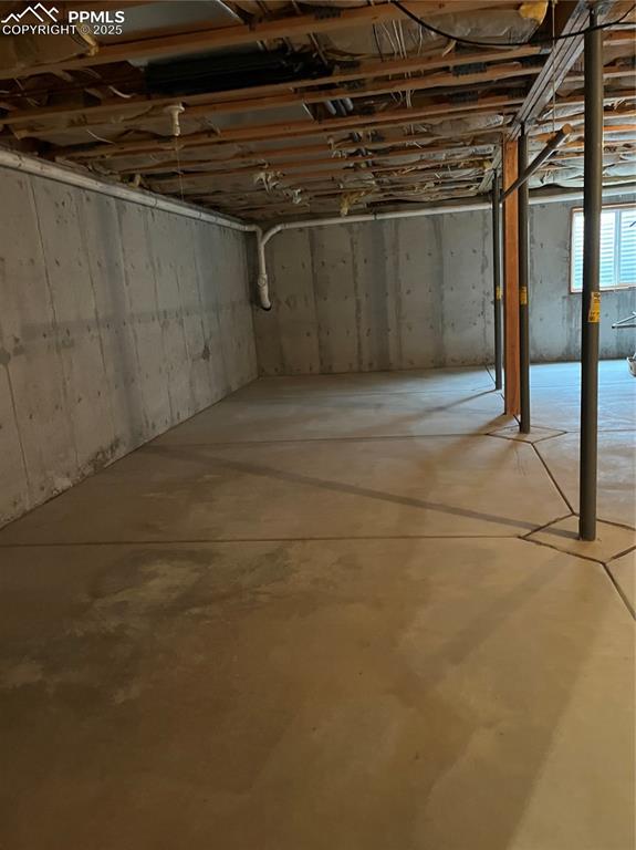 Image 12 of 12: rest of the unfinished basement also has an egress window is total 54 X 17