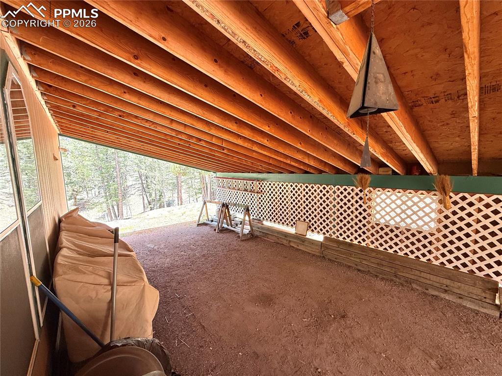 Image 50 of 50: Carport off rear of house