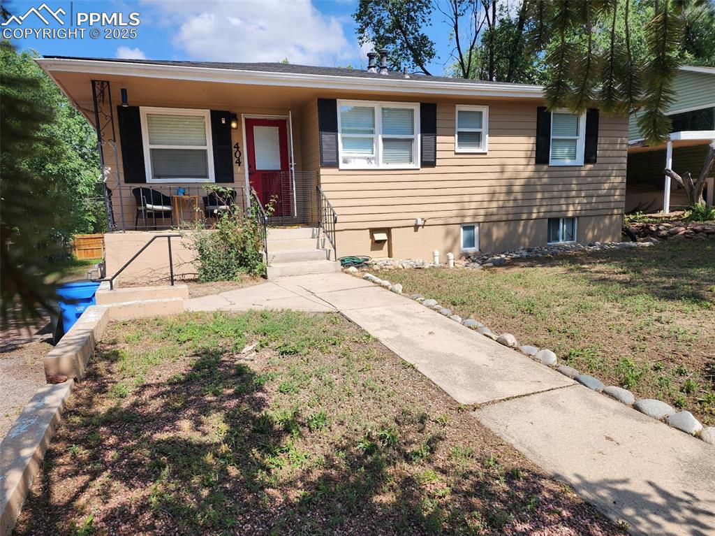 Image 2 of 24: Front porch and entrance to Unit A 