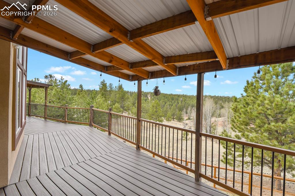Image 26 of 41: Trex Style terrace with a view of trees
