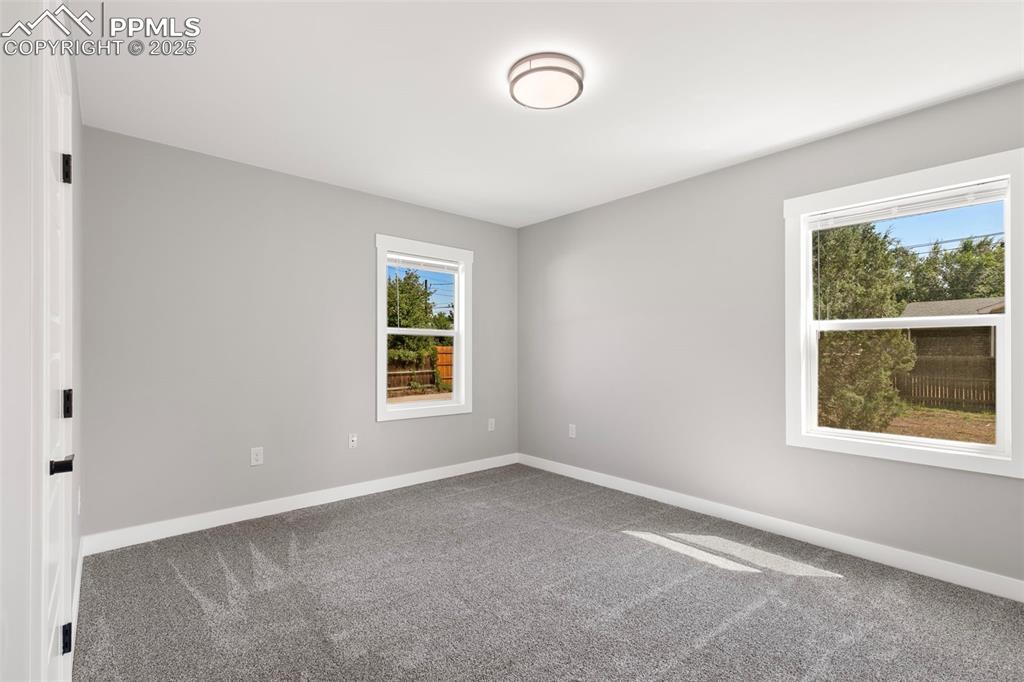 Image 19 of 48: Second main level bedroom