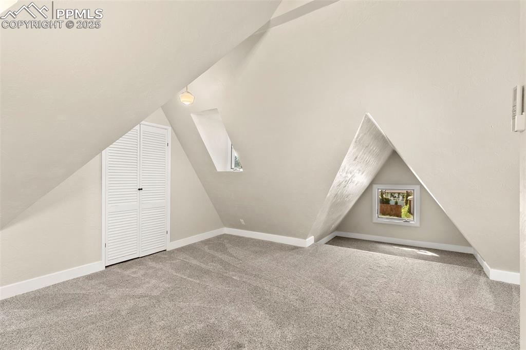 Image 31 of 48: Upper level secondary bedroom