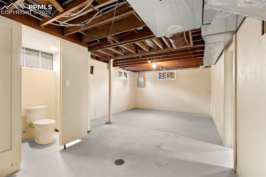 Image 39 of 48: Functioning half bath in the basement.  There is also shower plumbing in pl
