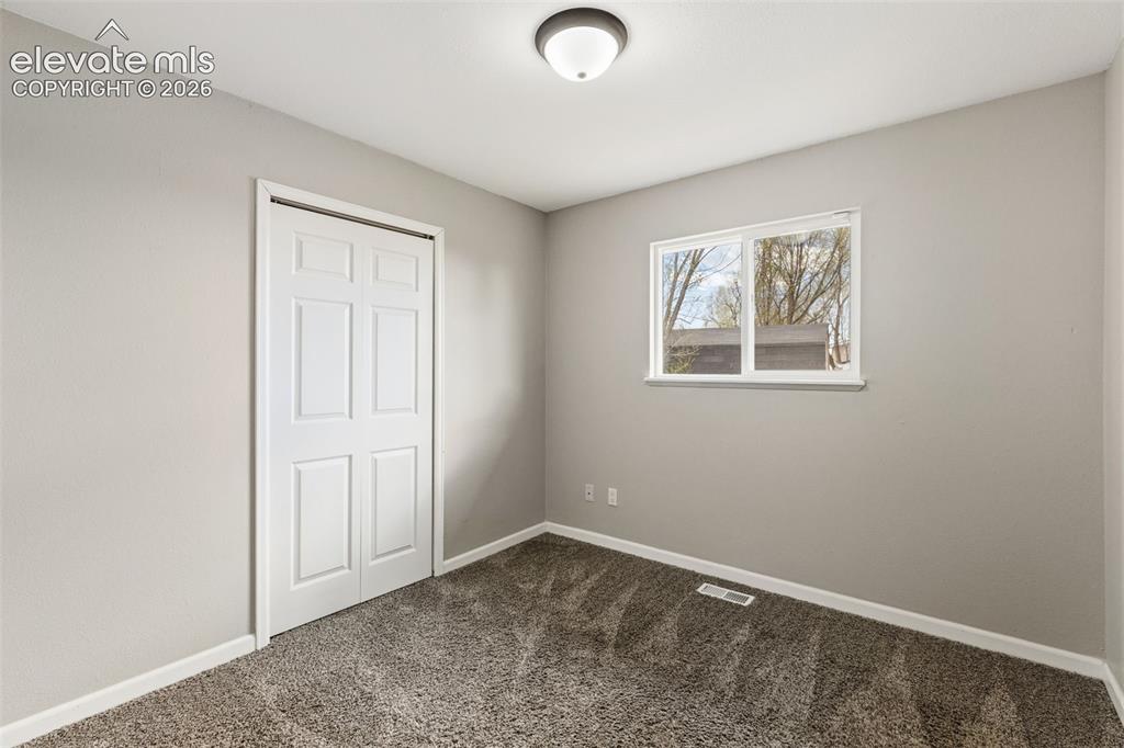 Image 12 of 22: 1st bedroom