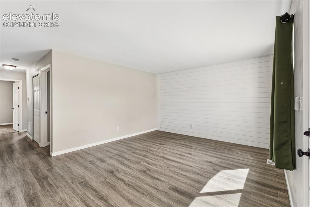 Image 6 of 22: Wider view of Living Room