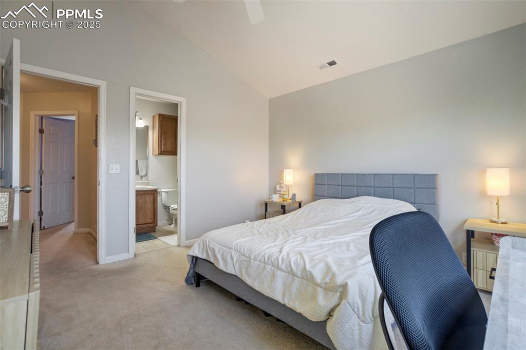 Image 19 of 29: Primary Bedroom with Attached Bath & Walk-in-Closet