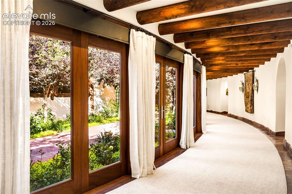 Image 19 of 49: Hallway to Bedrooms
