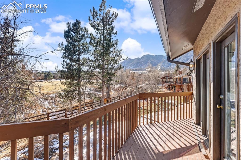 Image 19 of 50: Views of Cheyenne Mountain of back deck